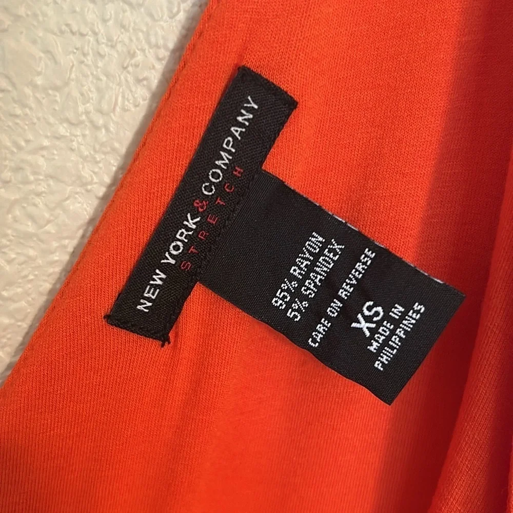 Women’s New York and Co orange maxi dress size XS.